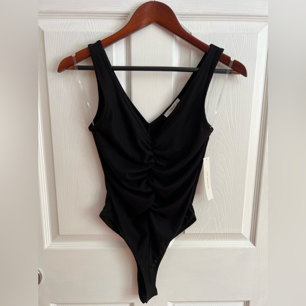 Timing Cinched black bodysuit.